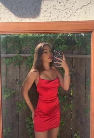 1. Sultry Aleina Topp in Red Dress