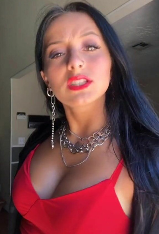 Luscious Brooke Sanchez Shows Cleavage in Red Crop Top