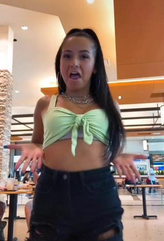 Sultry Brooke Sanchez Shows Cleavage in Light Green Crop Top