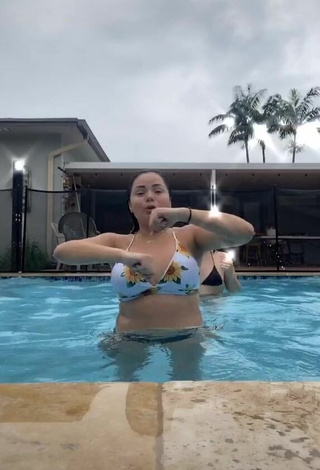 Sultry Sammy Duarte Shows Cleavage in Floral Bikini Top at the Swimming Pool