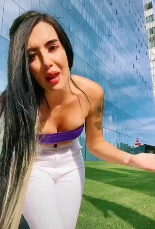 Luscious Adriana Valcárcel in Violet Tube Top in a Street