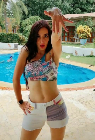 2. Sexy Adriana Valcárcel in Floral Bikini Top at the Swimming Pool