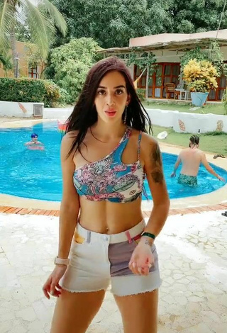 5. Sexy Adriana Valcárcel in Floral Bikini Top at the Swimming Pool