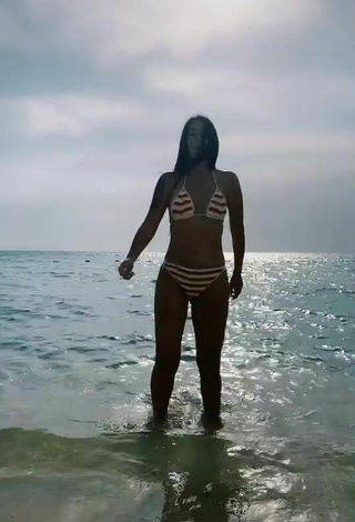 2. Sexy Adriana Valcárcel in Striped Bikini in the Sea