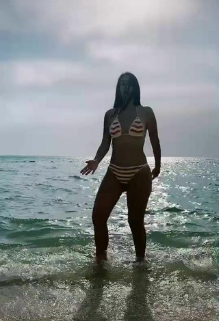 3. Sexy Adriana Valcárcel in Striped Bikini in the Sea