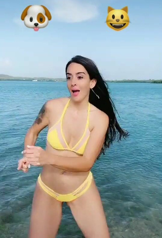 2. Titillating Adriana Valcárcel in Yellow Bikini in the Sea