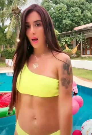 2. Sultry Adriana Valcárcel in Yellow Bikini at the Pool