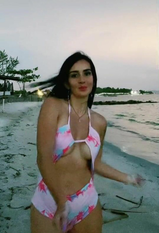 5. Luscious Adriana Valcárcel in Floral Swimsuit at the Beach (Side Boob)