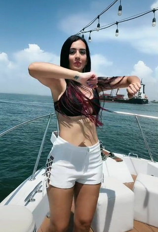 3. Luscious Adriana Valcárcel in Black Bikini Top on a Boat