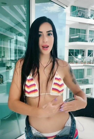 2. Hot Adriana Valcárcel in Striped Bikini Top