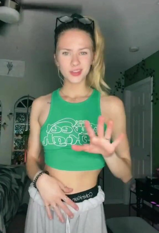 2. Titillating Ali Mykal in Green Crop Top