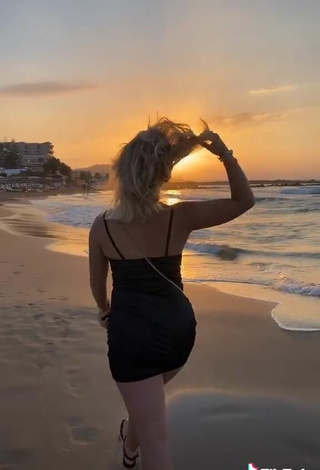 4. Luscious Alina Mour in Black Dress at the Beach