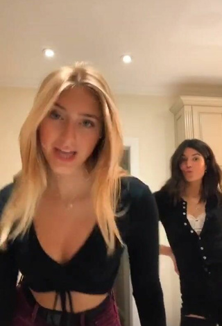 Sexy Ally Jenna Shows Cleavage in Black Crop Top