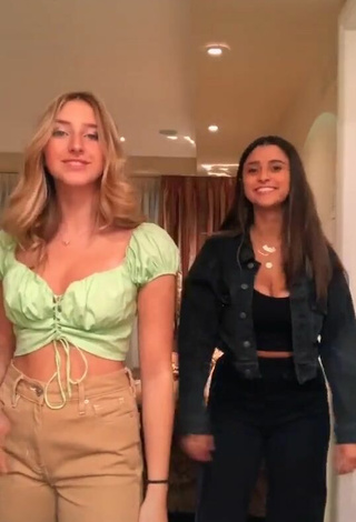 Titillating Ally Jenna Shows Cleavage in Light Green Crop Top