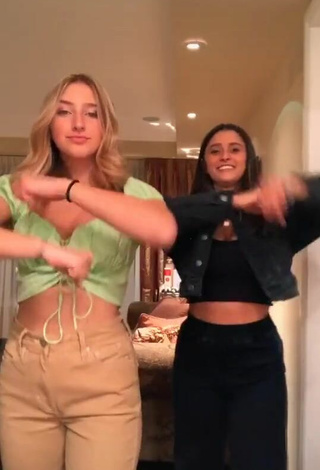 2. Titillating Ally Jenna Shows Cleavage in Light Green Crop Top