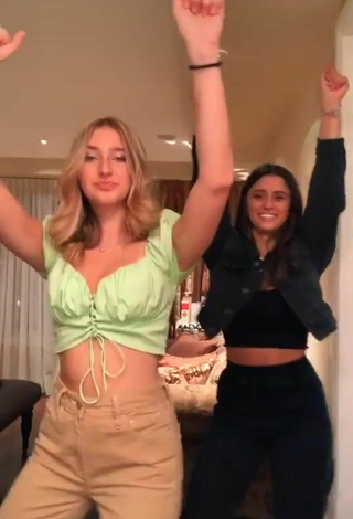 3. Titillating Ally Jenna Shows Cleavage in Light Green Crop Top