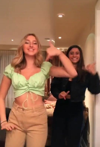 5. Titillating Ally Jenna Shows Cleavage in Light Green Crop Top