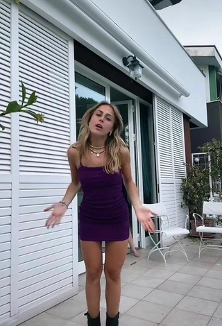 3. Sultry Ambra Cotti in Violet Dress