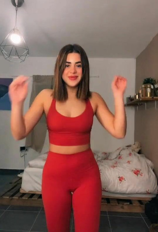 Sultry Angel Baranes in Red Leggings