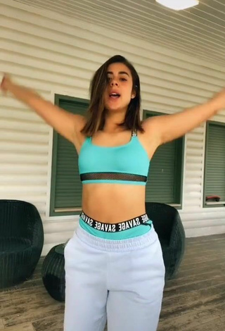 2. Sexy Angel Baranes Shows Cleavage in Green Sport Bra