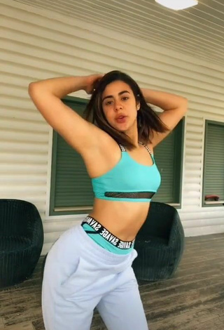 4. Sexy Angel Baranes Shows Cleavage in Green Sport Bra