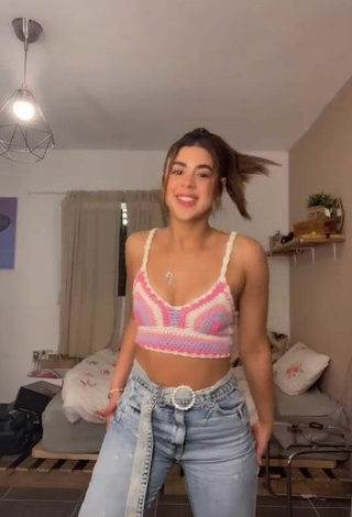 Titillating Angel Baranes Shows Cleavage in Crop Top