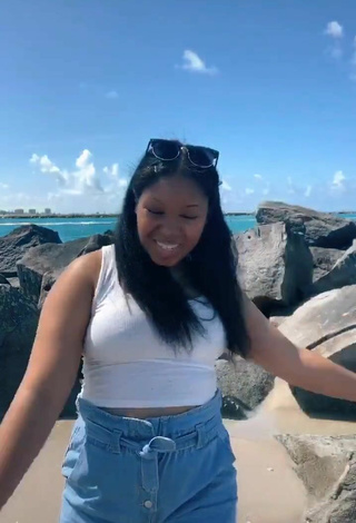 Sultry Asha Christine in White Crop Top at the Beach