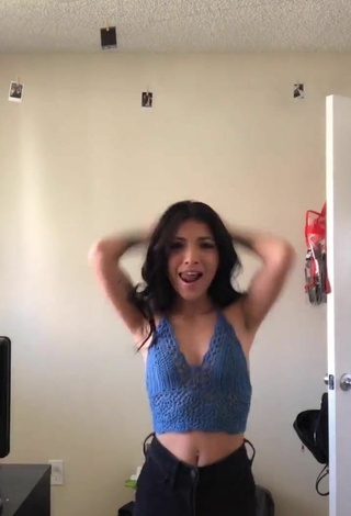 Sultry Ashley Valdez Shows Cleavage in Blue Crop Top