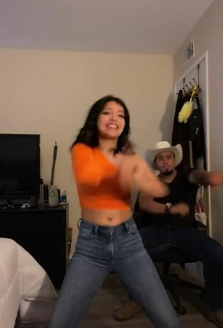 3. Titillating Ashley Valdez in Orange Crop Top