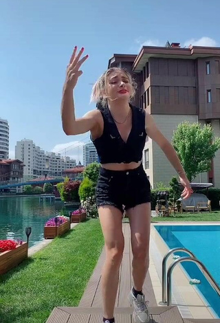 Sultry Asya Burcum in Black Crop Top at the Pool