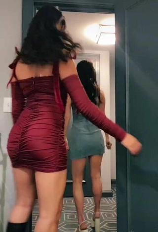 4. Sultry Avani Gregg in Red Dress