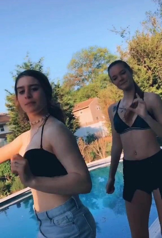 5. Titillating Bri Powell in Black Bikini Top at the Swimming Pool