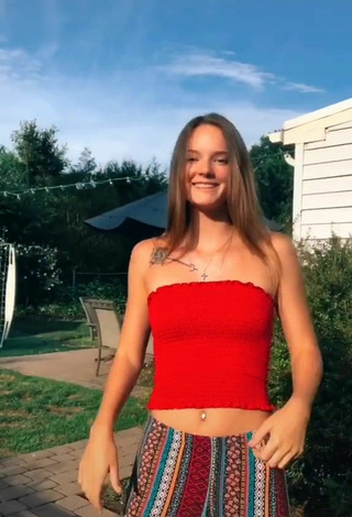 Sultry Bri Powell in Red Tube Top