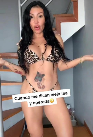 3. Luscious Adriana Espitia Shows Cleavage in Leopard Bikini