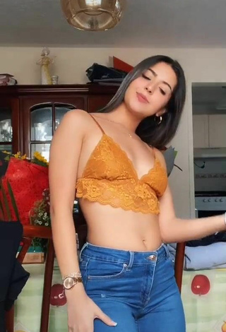 Cute Adriana Carballo in Orange Crop Top