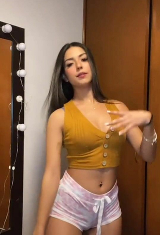 Titillating Adriana Carballo in Orange Crop Top