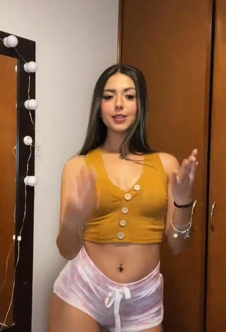 3. Titillating Adriana Carballo in Orange Crop Top