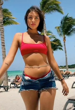 Magnetic Alexia García in Appealing Red Bikini at the Beach