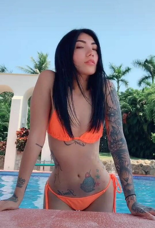 Sultry Nicole Amado in Electric Orange Bikini at the Pool