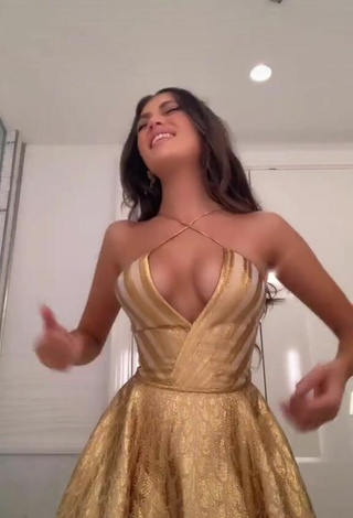 3. Luscious Amelie Zilber in Golden Dress (Side Boob)