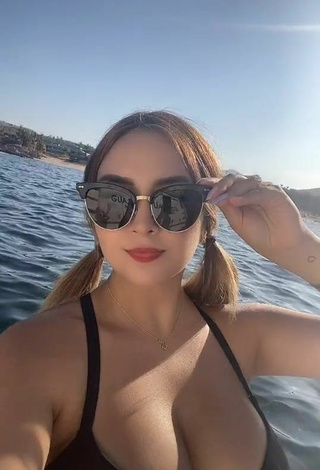 Sultry Abril Abdamari Garza Alonso Shows Cleavage in Black Bikini Top on a Boat