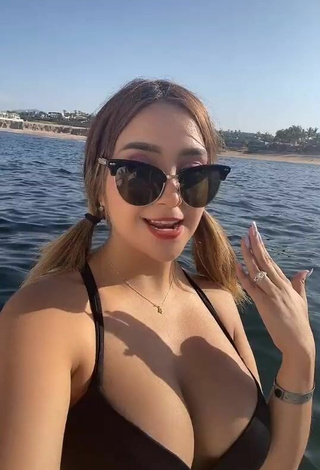 4. Sultry Abril Abdamari Garza Alonso Shows Cleavage in Black Bikini Top on a Boat