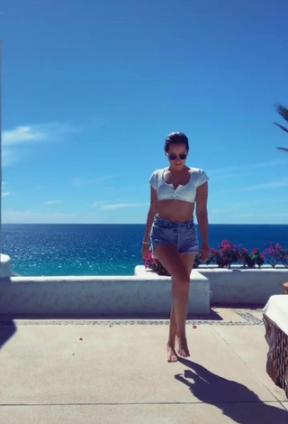 4. Luscious Ashley Tisdale in White Crop Top in the Sea