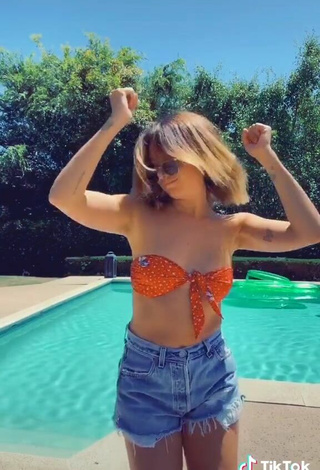 5. Luscious Ashley Tisdale in Orange Bikini Top at the Pool