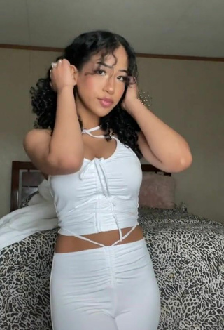 3. Luscious Aya Tanjali Shows Cleavage in White Crop Top