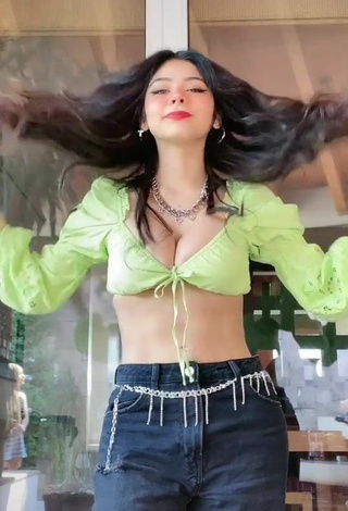 Titillating Aylin Criss Shows Cleavage in Lime Green Crop Top