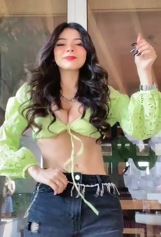 3. Titillating Aylin Criss Shows Cleavage in Lime Green Crop Top