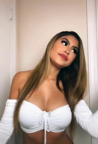 3. Attractive Desiree Montoya Shows Cleavage in White Crop Top