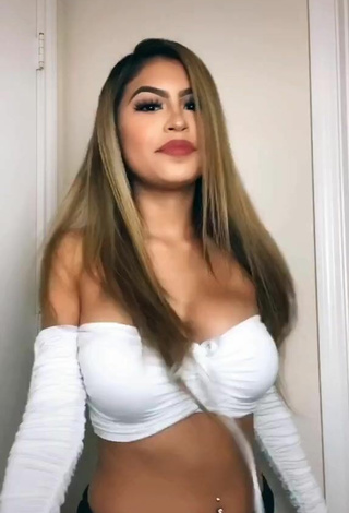 5. Attractive Desiree Montoya Shows Cleavage in White Crop Top