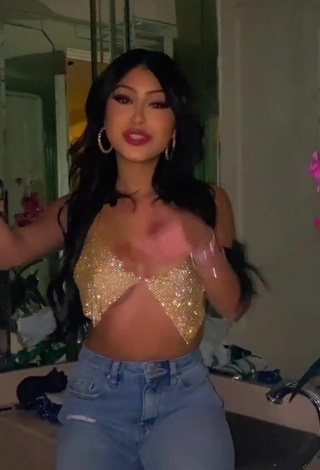 2. Desiree Montoya Shows Cleavage in Alluring Silver Crop Top